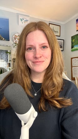 Laura MacGregor with microphone