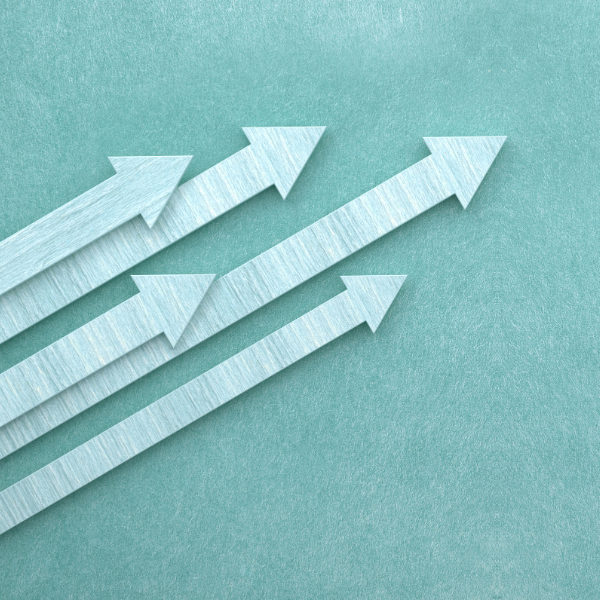 teal arrows pointing up and to the right